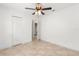 Bright bedroom with two closets and view to bathroom at 1208 Roma Ct, Orlando, FL 32825