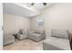 Cozy living room with tile floors and comfortable seating at 1208 Roma Ct, Orlando, FL 32825