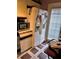 Kitchen area with refrigerator, microwave, and decor at 135 Pine Island Cir, Kissimmee, FL 34743