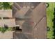 Aerial view of the roof of a townhome with driveway and landscaping at 1809 Portofino Meadows Blvd, Orlando, FL 32824
