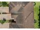Aerial view of the roof of a townhome with driveway and landscaping at 1809 Portofino Meadows Blvd, Orlando, FL 32824