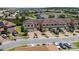 Beautiful townhome with brick driveway, attached garages, and lush landscaping in a well-maintained community at 1809 Portofino Meadows Blvd, Orlando, FL 32824