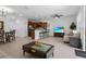 Open concept living room featuring a kitchen, dining area, and a comfortable seating area at 1809 Portofino Meadows Blvd, Orlando, FL 32824