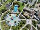 Aerial view showcasing the community's amenities including a playground, lazy river, and splash pad at 1817 Caribbean View Ter, Kissimmee, FL 34747