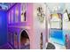 A princess-themed room with a custom castle bunk bed and chandelier at 1817 Caribbean View Ter, Kissimmee, FL 34747