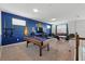 Spacious game room with a pool table, gaming chairs, and a entertainment center at 1817 Caribbean View Ter, Kissimmee, FL 34747
