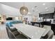 Open-concept living space with modern kitchen, comfortable living area, and stylish dining space at 1817 Caribbean View Ter, Kissimmee, FL 34747