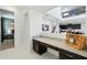 Convenient office nook featuring granite countertops and custom cabinetry on the main floor of this home at 1817 Caribbean View Ter, Kissimmee, FL 34747