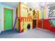 Entertaining playroom features a climbing area, games, and colorful decor at 1817 Caribbean View Ter, Kissimmee, FL 34747