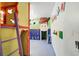 Whimsical playroom with colorful murals and a climbing structure at 1817 Caribbean View Ter, Kissimmee, FL 34747