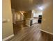Bright kitchen seamlessly connects to the living room, creating an open and inviting space at 19935 Villa Isle Dr # 107, Orlando, FL 32821