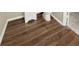 Close-up view of durable and stylish wood-look flooring in bathroom at 2317 10Th St, St Cloud, FL 34769