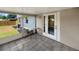Enclosed patio perfect for outdoor seating, with tile flooring and views of the backyard at 2317 10Th St, St Cloud, FL 34769