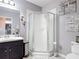Bathroom features a corner shower with subway tile at 238 Granada Ave, Davenport, FL 33837