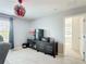 Bonus room offers a media center with movie decorations at 238 Granada Ave, Davenport, FL 33837
