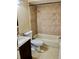 Bathroom featuring tiled shower/tub and modern vanity at 2408 Barley Club Ct # 2, Orlando, FL 32837