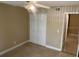 Bedroom featuring a closet with natural light streaming through the window creating a welcoming atmosphere at 2408 Barley Club Ct # 2, Orlando, FL 32837