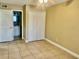 Bedroom featuring a closet with natural light streaming through the window creating a welcoming atmosphere at 2408 Barley Club Ct # 2, Orlando, FL 32837