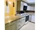 An updated kitchen with stainless steel appliances and granite countertops at 2408 Barley Club Ct # 2, Orlando, FL 32837