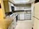 Updated kitchen with stainless steel appliances and granite countertops at 2408 Barley Club Ct # 2, Orlando, FL 32837
