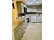 An updated kitchen with granite countertops and stainless steel appliances at 2408 Barley Club Ct # 2, Orlando, FL 32837