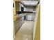 Well-lit kitchen featuring granite countertops, tile backsplash, and modern appliances at 2408 Barley Club Ct # 2, Orlando, FL 32837