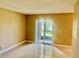 A bright living room with tile floors and sliding glass doors at 2408 Barley Club Ct # 2, Orlando, FL 32837