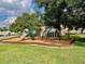 Outdoor playground with slide, swings, and climbing structure for community enjoyment at 2408 Barley Club Ct # 2, Orlando, FL 32837