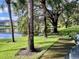 Scenic pond with ducks and grassy shoreline providing a tranquil view at 2408 Barley Club Ct # 2, Orlando, FL 32837