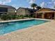 Large pool with tables and chairs, great for summertime fun at 2408 Barley Club Ct # 2, Orlando, FL 32837