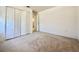 Neutral bedroom with carpet, closet, and light paint, ready for personalization at 2511 Balmoral Dr, Kissimmee, FL 34744
