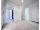 Bedroom features a walk-in closet and several doorways at 2511 Balmoral Dr, Kissimmee, FL 34744