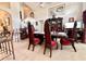Formal dining room featuring a grand table and chairs with a decorative hutch at 2511 Balmoral Dr, Kissimmee, FL 34744