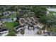 Exterior of townhomes with manicured landscaping and private garages at 2662 Emerald Lake Ct, Kissimmee, FL 34744