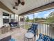 Enjoy the private screened in patio with ceiling fans and waterfront view at 2662 Emerald Lake Ct, Kissimmee, FL 34744
