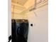 Laundry room with washer and dryer, plus wire shelving at 2663 Oneida Loop, Kissimmee, FL 34747