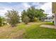 Well-maintained lawn and screened in porch at 301 Wingdale Way, Davenport, FL 33897