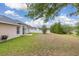 Large backyard featuring a well-maintained lawn at 301 Wingdale Way, Davenport, FL 33897