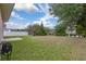Large backyard with shade trees at 301 Wingdale Way, Davenport, FL 33897