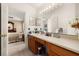 Bathroom featuring a large vanity area and entrance to the main bedroom at 301 Wingdale Way, Davenport, FL 33897