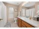 Cozy bathroom features a vanity, and toilet at 301 Wingdale Way, Davenport, FL 33897
