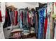 Walk-in closet featuring shelving and hanging storage for clothing at 301 Wingdale Way, Davenport, FL 33897