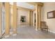 Spacious open foyer features tile flooring and neutral tones, leading to the rest of the home at 301 Wingdale Way, Davenport, FL 33897