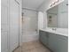 Clean bathroom featuring a bath tub, shower, and a large mirror at 3344 Corona Village Way # 207, Orlando, FL 32835