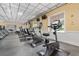 Well-equipped gym featuring stationary bikes and large windows for natural light at 3344 Corona Village Way # 207, Orlando, FL 32835