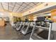 Well-equipped gym featuring treadmills and a mirror for monitoring progress at 3344 Corona Village Way # 207, Orlando, FL 32835