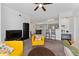 Inviting living room with view of open kitchen and dining space, perfect for entertaining at 3344 Corona Village Way # 207, Orlando, FL 32835