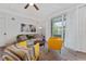 Cozy living room boasts neutral tones, comfortable seating, and sliding glass doors at 3344 Corona Village Way # 207, Orlando, FL 32835