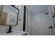 This contemporary bathroom features a sleek design, modern fixtures, and a spacious, glass-enclosed shower at 3669 General Marshall Rd, Daytona Beach, FL 32124