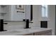 Bathroom featuring double sinks with a modern-style faucet and decorative framed mirror at 3669 General Marshall Rd, Daytona Beach, FL 32124